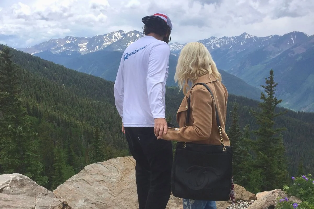the couple looking over the mountain is overcoming their fears. fear has a huge impact on mental health and holds us back, which is why overcoming fear is so important